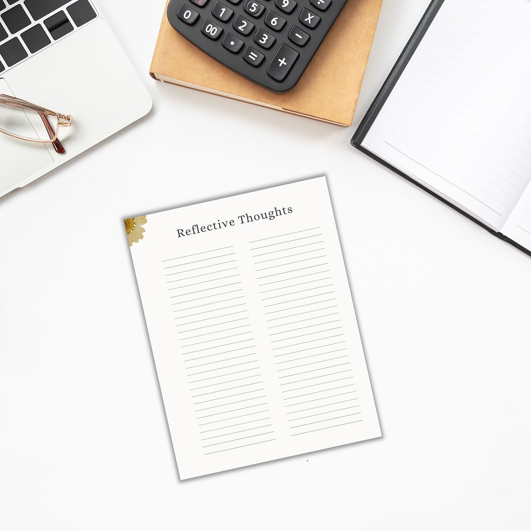 Top view of a Reflective Thoughts notepad, a laptop, a calculator, glasses, and an open notebook on a white surface. Nearby sits the Vision Board Bundle to inspire your next big idea.