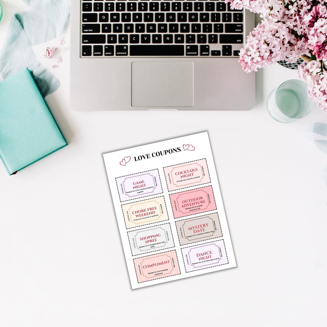 a laptop computer sitting on top of a white desk
