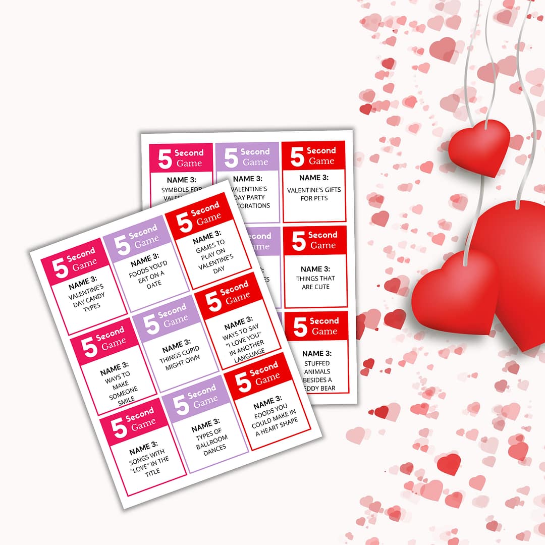 Two Valentine's 5-Second Game PLR cards showcase various challenges. The backdrop is decorated with scattered hearts and hanging red heart ornaments, creating an ideal romantic atmosphere for your game collection.