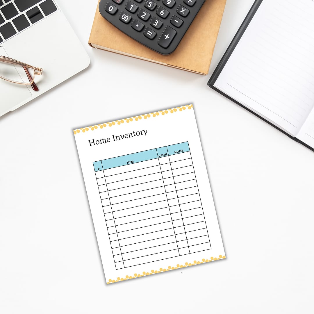 A home inventory form rests on a white desk beside a laptop, glasses, calculator, and open notebook, beautifully enhanced by the Free: Spring-themed Planner Templates.